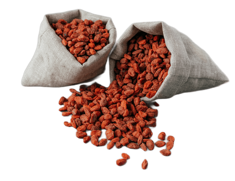 Rohe rote Bio-Goji-Beeren in kleinen rustikalen Säcken